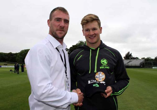 Where it began. John Mooney presents debut cap to Barry McCarthy (CricketEurope)