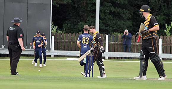 McCusker holds the catch to remove Moore (CricketEurope)