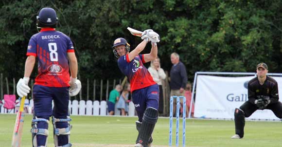 McCollum smashes a six into the sightscreen (CricketEurope)
