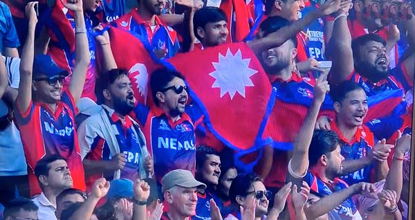 Nepal fans cheer on their team