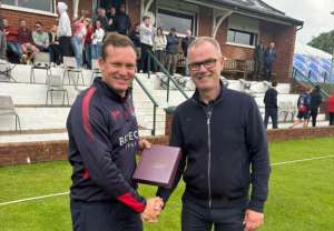 Graham Hume of Waringstown receives Man of the Match award from Trevor McKeown